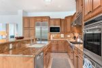 Fully Equipped Gourmet Kitchen Features Wolf And Sub-Zero Appliances